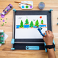 Guided Hands Assistive Hand Mobility Device painting a forest scene